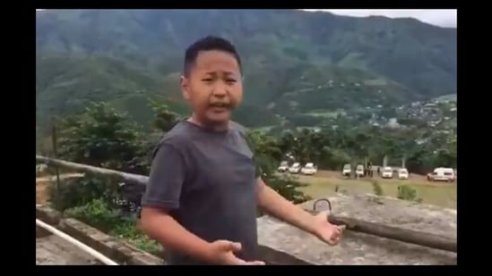 A video of a young boy reporting