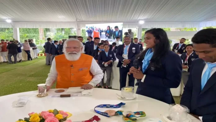 PM Narendra Modi meets Indian Tokyo Olympic contingents and hosts a