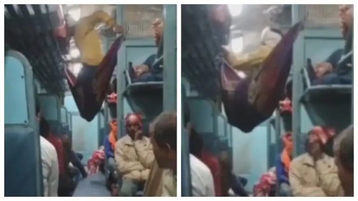 Man makes makeshift bed in train aisle by using blanket in viral video. Jugaad pro max, says Internet